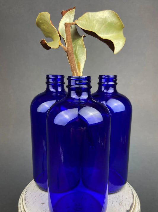 Cobalt blue apothecary bottles with stoppers decorative jars, set of 3 glass display pieces on Tampa Home & Garden Store