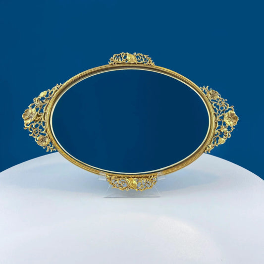 Vintage gold vanity tray with ornate floral motif, circular gilded frame on Tampa Home & Garden Store