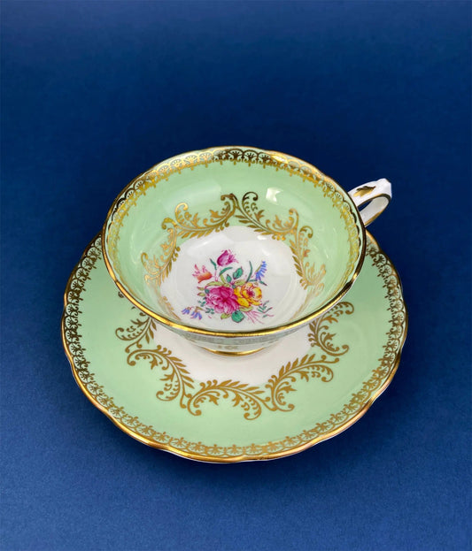 Grosvenor Fine Bone China mint teacup with gold filigree and floral center on mint saucer on Tampa Home & Garden Store