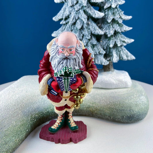Vintage Jolly Elf with Gifts and Bells figurine, red suit and gray beard on snowy base on Tampa Home & Garden Store