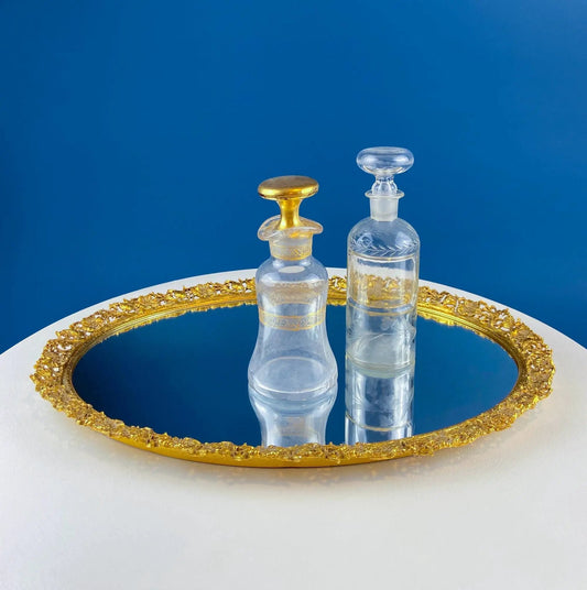 Vintage Gold Vanity Mirror Tray with ornate edge and two crystal decanters on mirrored surface on Tampa Home & Garden Store