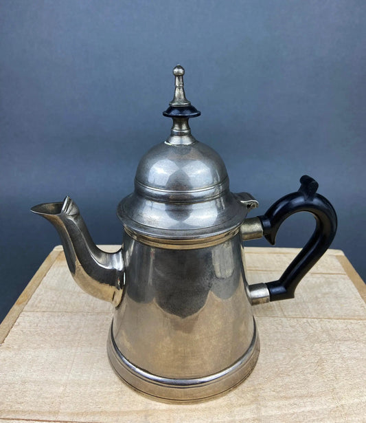 Vintage silver metal coffee pot with ornate lid finial and black handle on Tampa Home & Garden Store