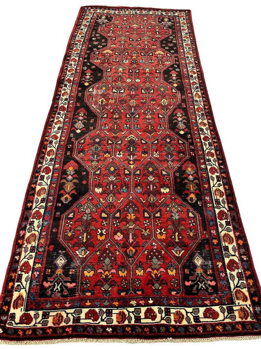 Vintage Persian Hosseinabad Runner Rug, red wool handwoven with medallions and black borders on Tampa Home & Garden Store