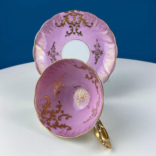 Vintage pink tea cups and saucers with gold accents on Tampa Home & Garden Store