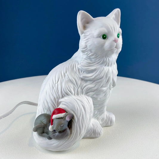 Vintage porcelain cat lamp, white cat figure with green eyes holding a small mouse on Tampa Home & Garden Store