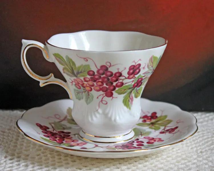 Royal Albert Primrose teacup and saucer set in bone china with berry pattern and gold trim on Tampa Home & Garden Store