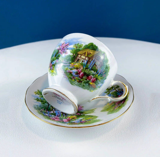 Vintage Royal Vale teacup and saucer 2-piece set with cottage garden scene on Tampa Home & Garden Store