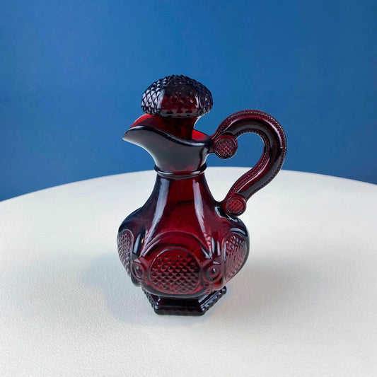 Avon Cape Cod oil vinegar bottle, vintage ruby red, with stopper and pressed glass rosette pattern on Tampa Home & Garden Store