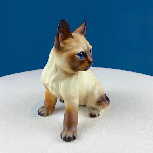 Vintage Siamese porcelain cat figurine with blue eyes, cream body and brown points on Tampa Home & Garden Store