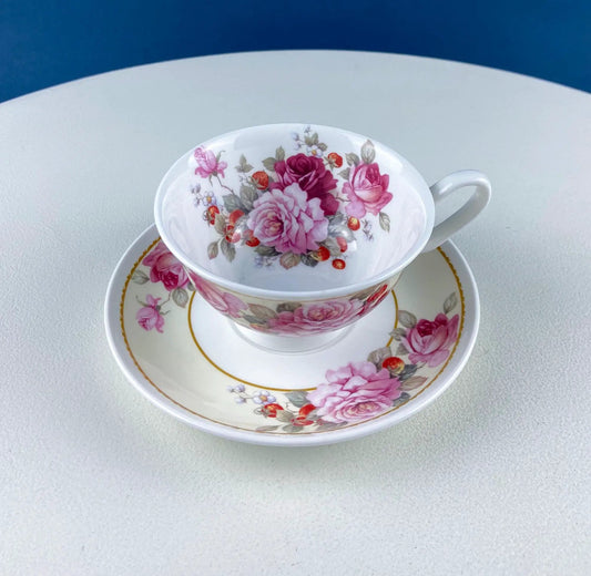 Vintage Stechcol tea cup and saucer set with pink roses floral pattern, gold trim on Tampa Home & Garden Store