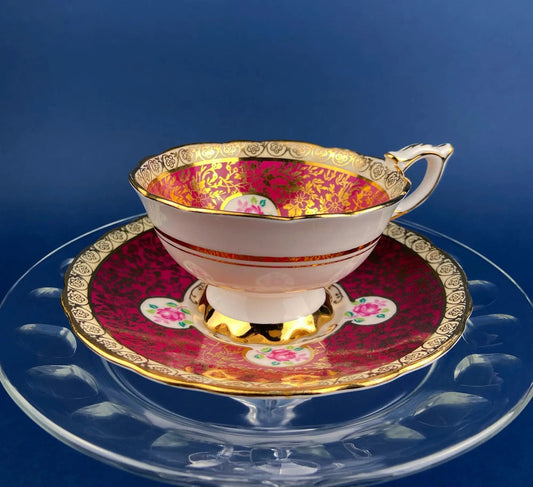 Vintage Royal Stafford teacup and saucer with pink floral interior and gold trim on Tampa Home & Garden Store