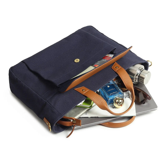 Voyager Canvas Leather Briefcase in navy with tan leather trim and brass hardware on Tampa Home & Garden Store