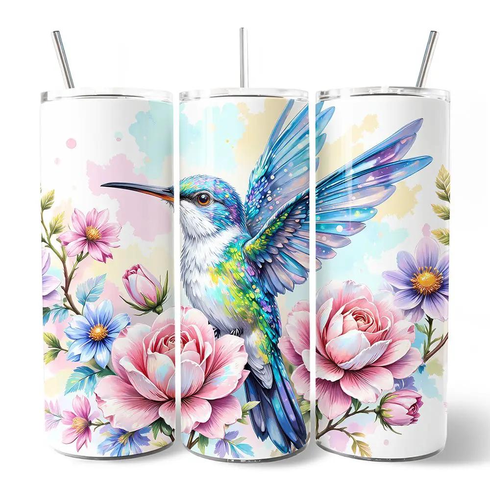 Tumbler trio 20oz with floral hummingbird design and vibrant flowers, lids and metal straws on Tampa Home & Garden Store