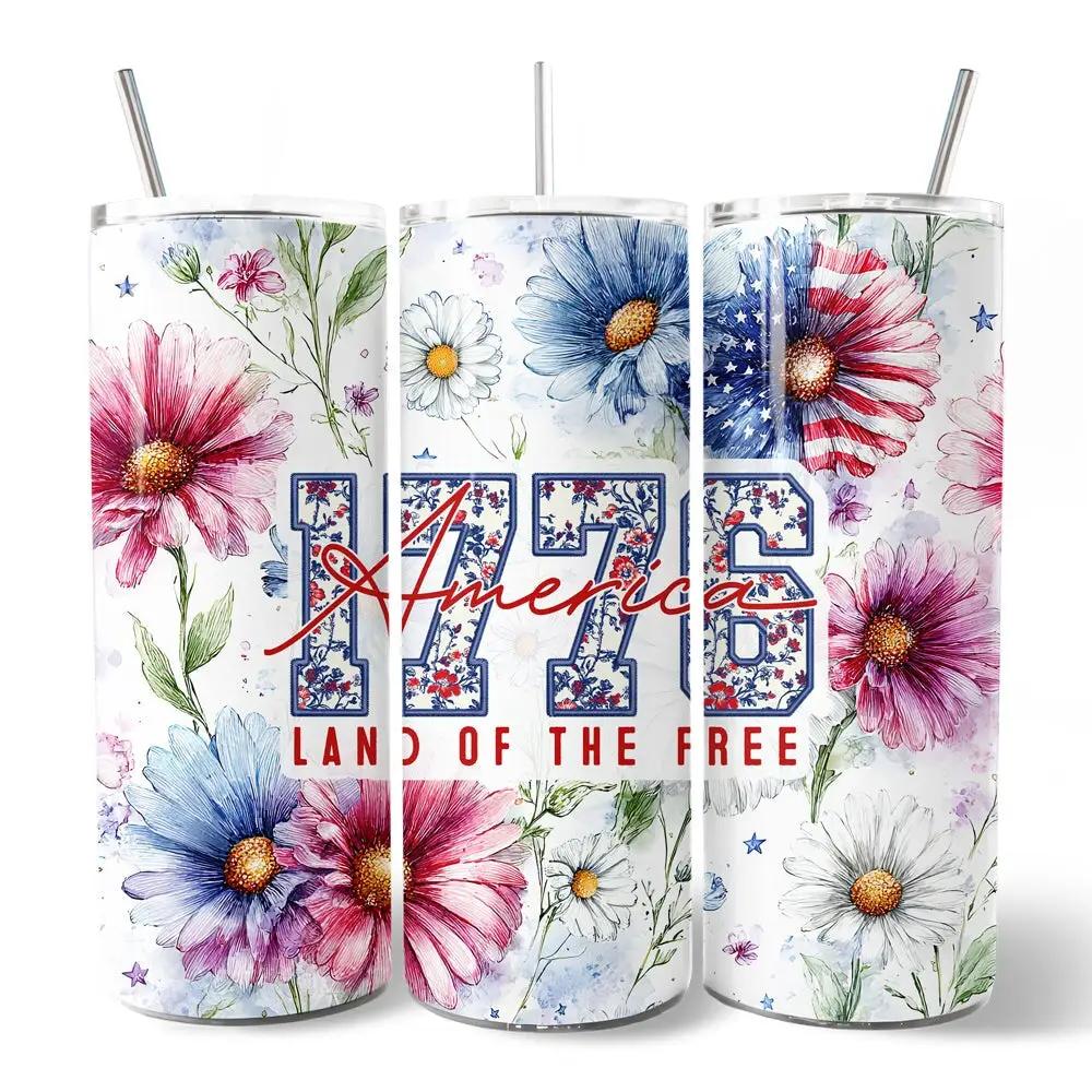 Three 20oz Retro America 1776 Daisy tumblers with lids and metal straws, floral daisy print on Tampa Home & Garden Store