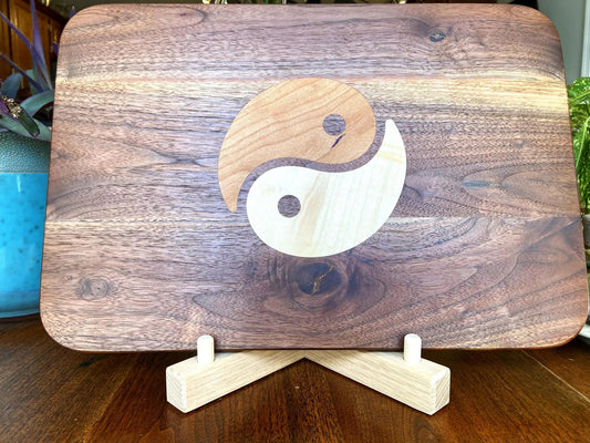 Walnut charcuterie board with Yin Yang inlay in light maple and dark walnut on Tampa Home & Garden Store