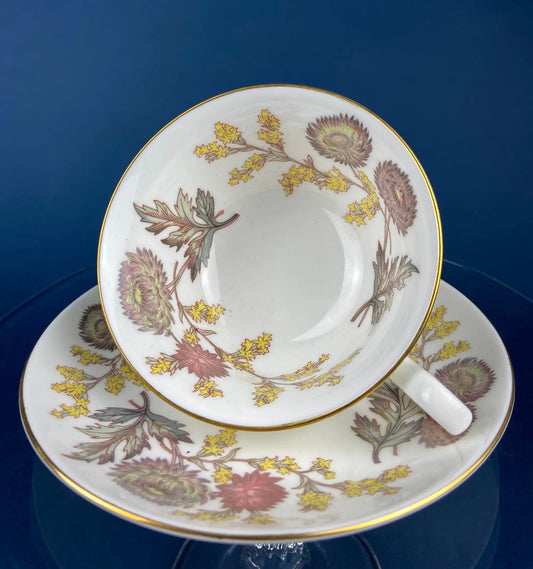 Wedgewood teacup and saucer in fine bone china with yellow floral motif and gold rim on Tampa Home & Garden Store