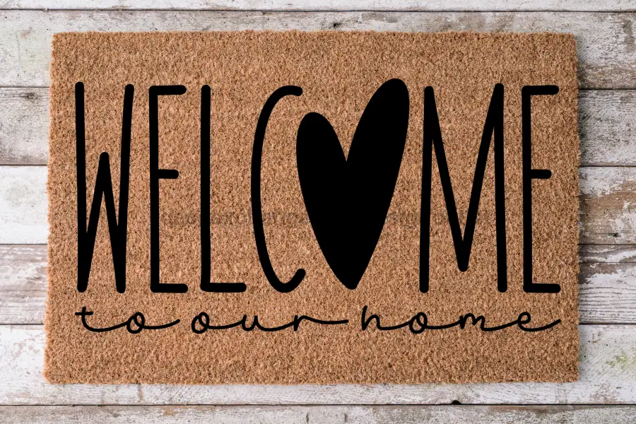 Door mat natural coir with bold black WELCOME and heart O, script to our home DecoExchange® on Tampa Home & Garden Store