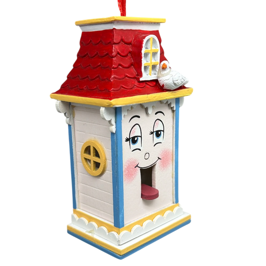 Whimsical wooden birdhouse ornament with red roof, light blue trim, and yellow window on Tampa Home & Garden Store
