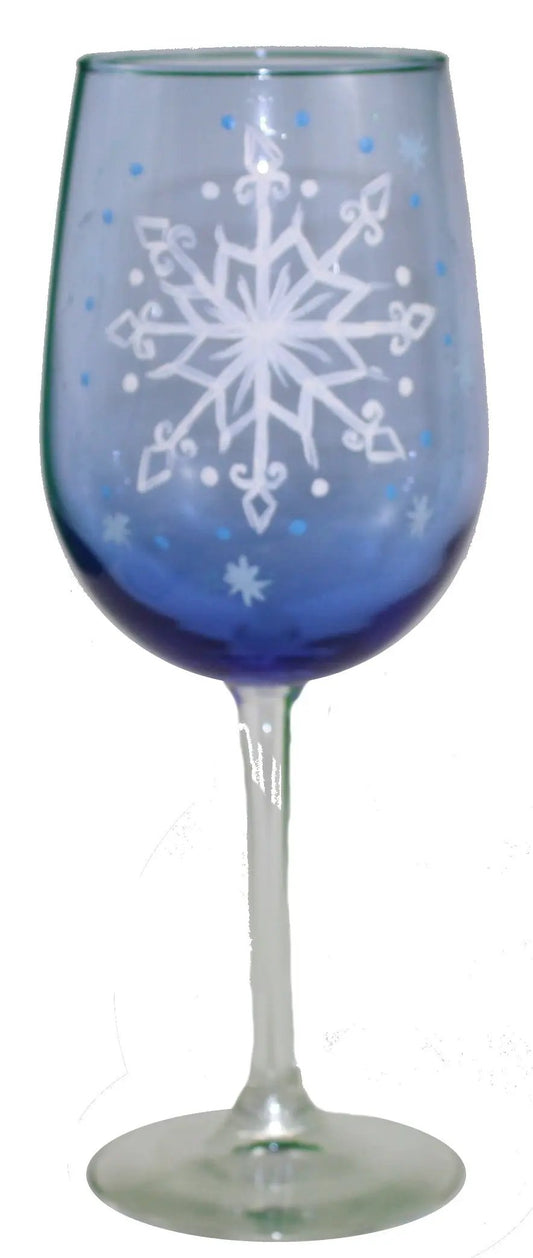 Whimsy Inspired stem wine glass with blue gradient and white snowflake motif on Tampa Home & Garden Store
