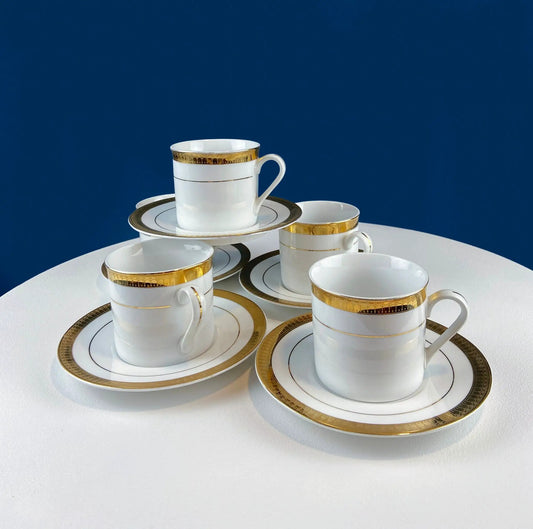 White Cups and Saucers With Gold Band Set of 5 with gold band rims on white table on Tampa Home & Garden Store