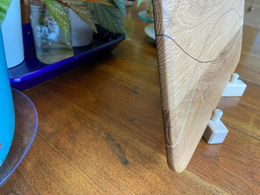 White oak charcuterie board with walnut banding, Fitzgerald Custom Woodcraft serving tray on Tampa Home & Garden Store