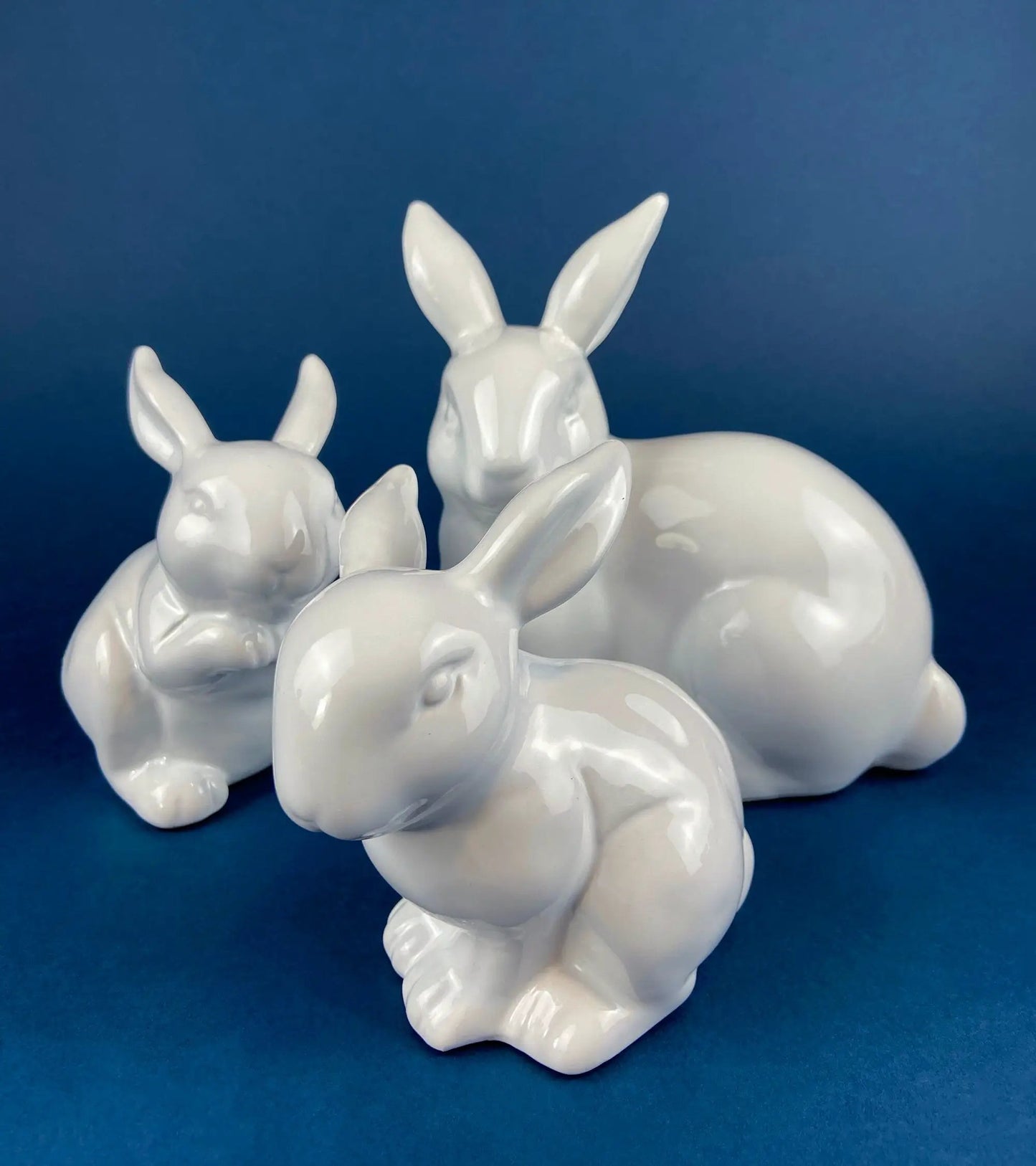 White porcelain bunny cupcake stand cluster of glossy rabbit figures on Tampa Home & Garden Store