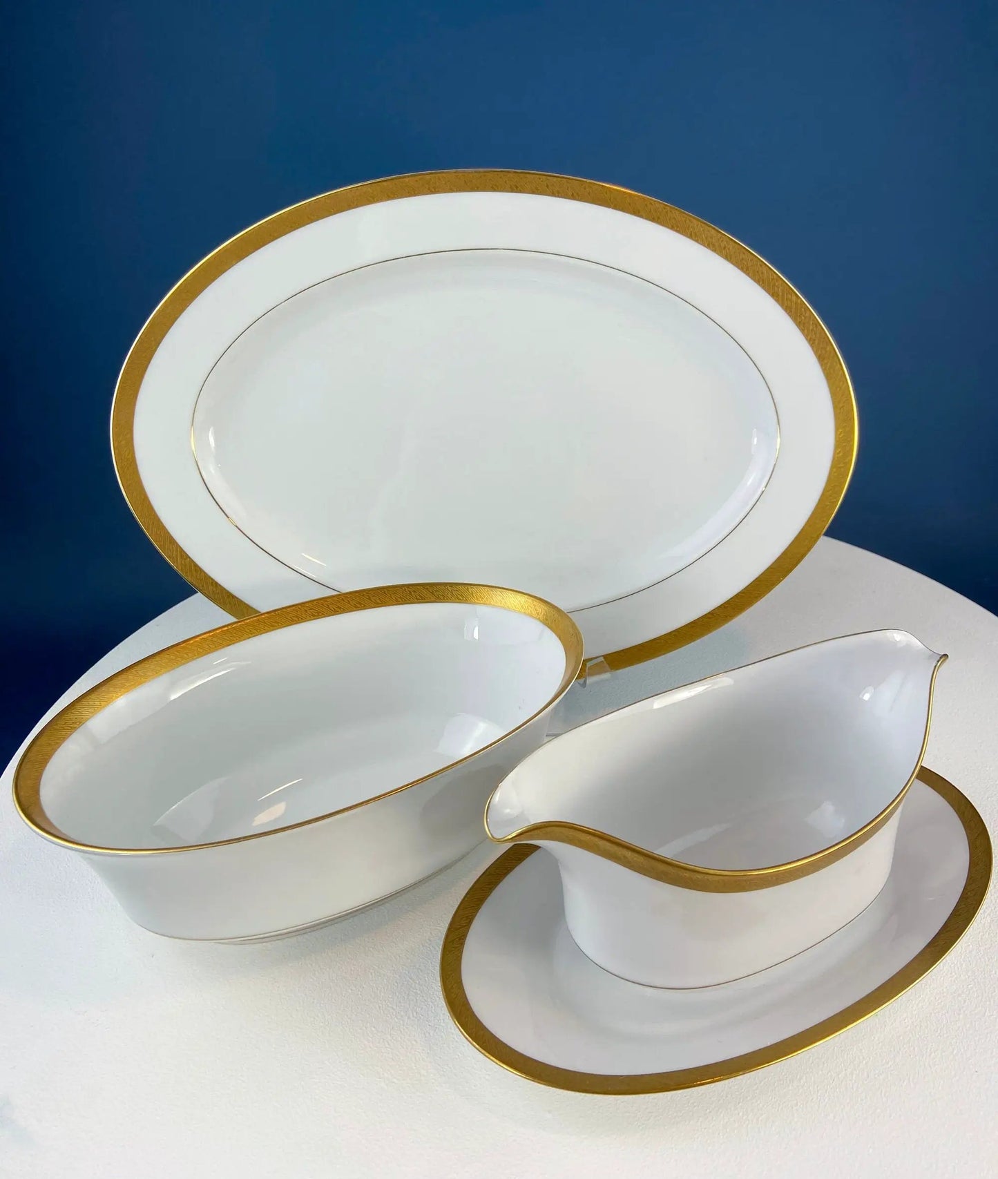 Set of 4 white porcelain oval serving bowls with gold band rims Anything Discovered on Tampa Home & Garden Store