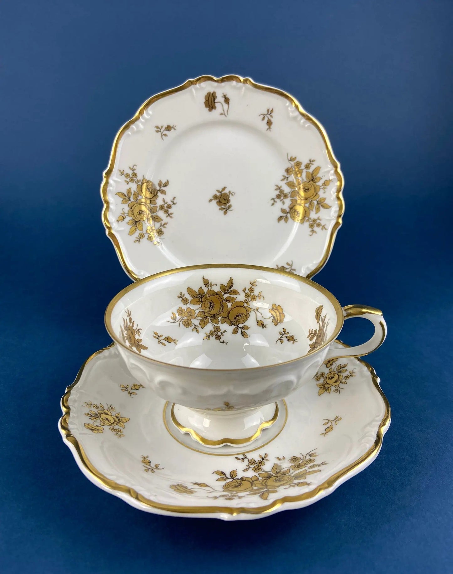 Paragon porcelain teacup and saucer set in antique white with gold floral trim on Tampa Home & Garden Store