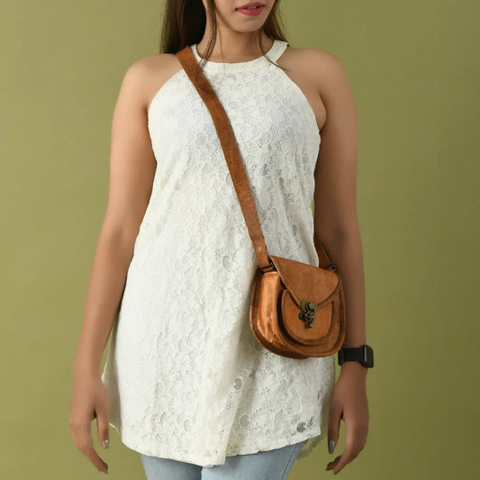 Willow Full Grain Leather Crossbody Sling Bag brown leather with adjustable strap worn diagonally on Tampa Home & Garden Store