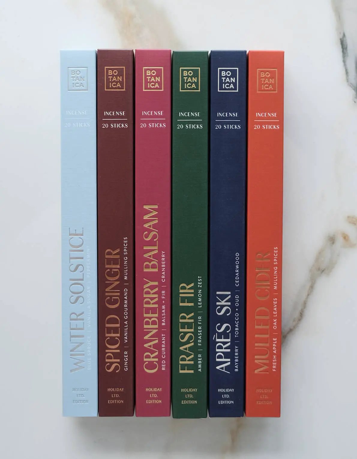 Winter Solstice Holiday Spruce and Peppermint incense by Botanica, six colorful 20-stick boxes on Tampa Home & Garden Store