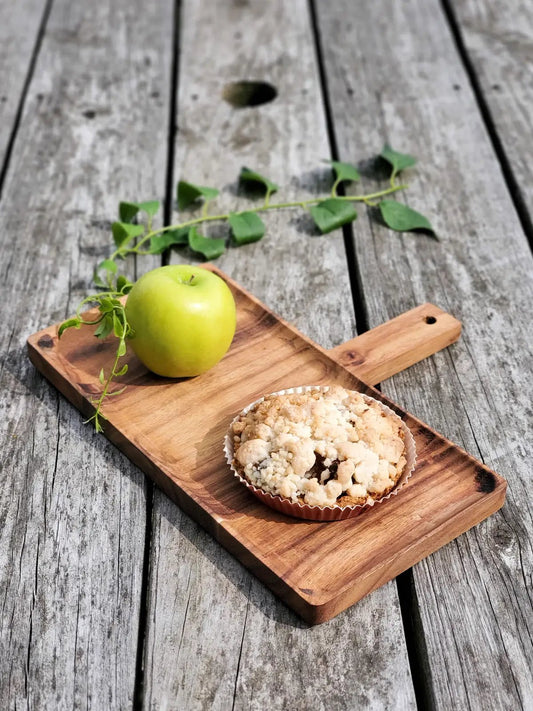 Handcrafted Albizia hardwood serving tray with handle on rustic wood, green apple and muffin on Tampa Home & Garden Store