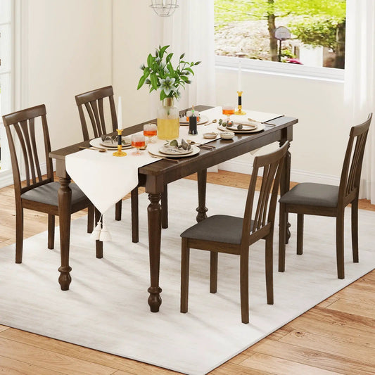 Wooden dining chairs set of six with gray linen upholstery around a dark brown table on Tampa Home & Garden Store