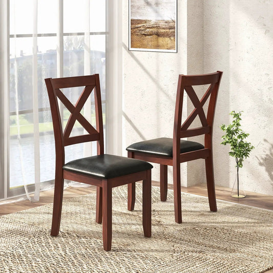 Set of 2 dark brown wooden kitchen chairs with black padded seats and X-back design on Tampa Home & Garden Store