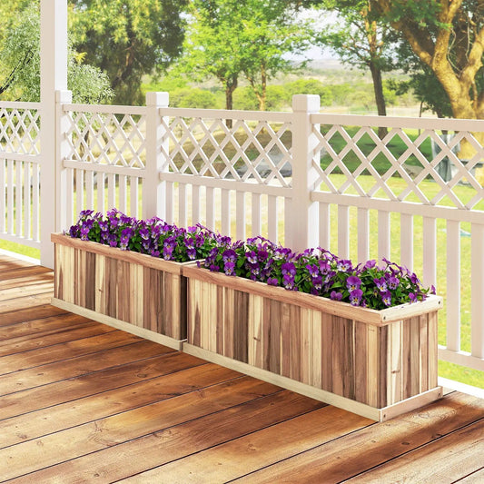 Natural Acacia wood raised garden bed with purple flowers on a deck beside lattice fence on Tampa Home & Garden Store