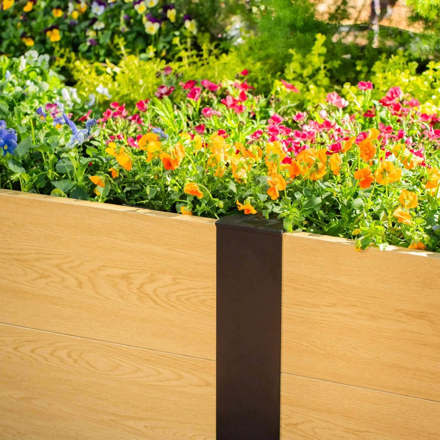 EverGrove 4x8 raised bed with woodgrain panels and dark corner posts on Tampa Home & Garden Store