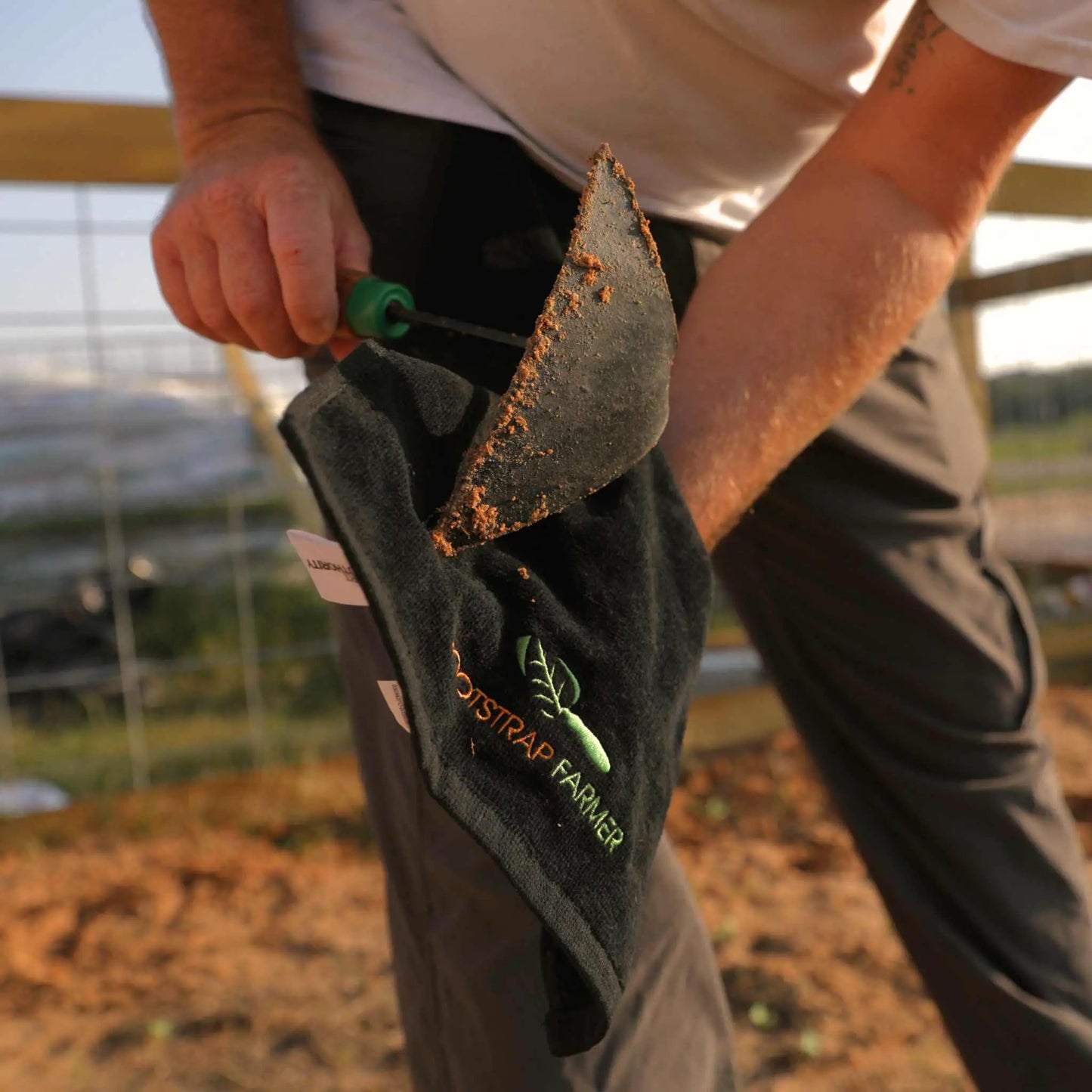 Workhorse Garden Towel for Growers black cotton Bootstrap Farmer outdoors with gloved hands on Tampa Home & Garden Store