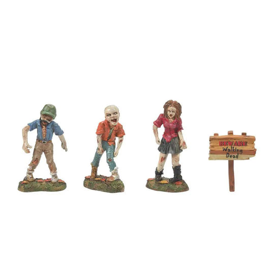 Zombie Crawl Set of 4 Magnetic Figurines: green-cap man, orange-shirt boy, pink-top girl on Tampa Home & Garden Store