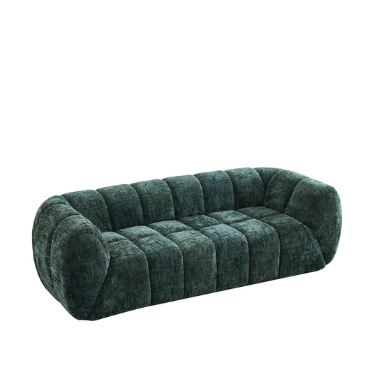 Modern sofa with piano-key backrest in emerald-green textured upholstery on Tampa Home & Garden Store