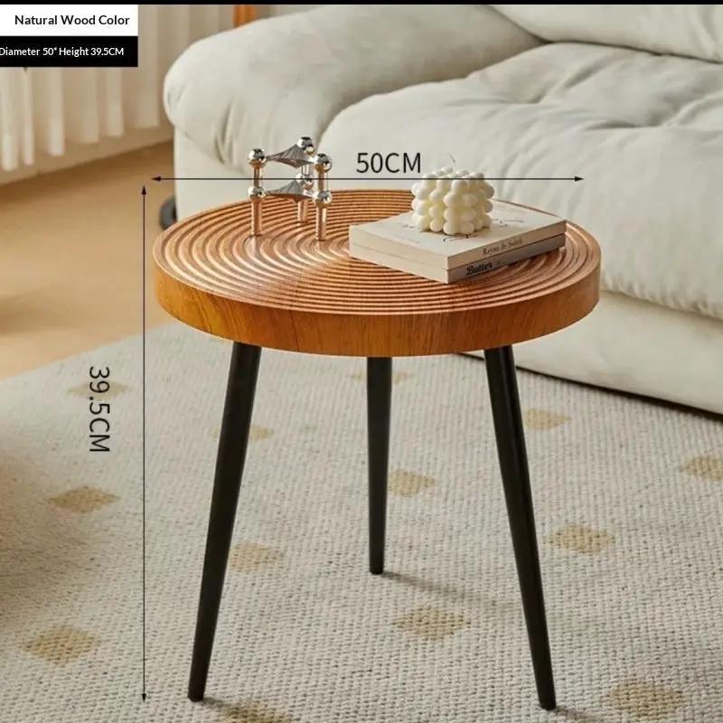 Solid wood growth-ring coffee table with natural finish, round 50cm diameter, black legs on Tampa Home & Garden Store