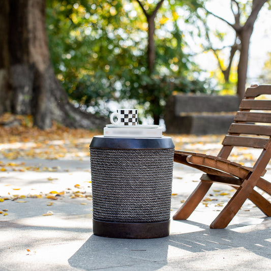 Outdoor dark brown braided cord MGO side table with round top and black base on Tampa Home & Garden Store