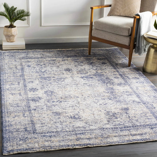 Accokeek Luxe Area Rug in Navy and Beige by Boutique Rugs with distressed pattern on Tampa Home & Garden Store