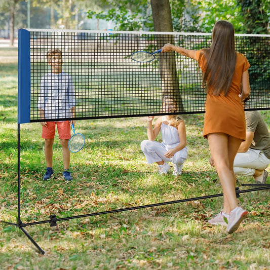 Adjustable badminton net stand with blue posts and black net in park on Tampa Home & Garden Store