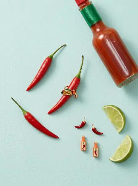 Taco Hot Sauce & Pepper Stud Set earrings with chili peppers and hot sauce bottle charms on Tampa Home & Garden Store