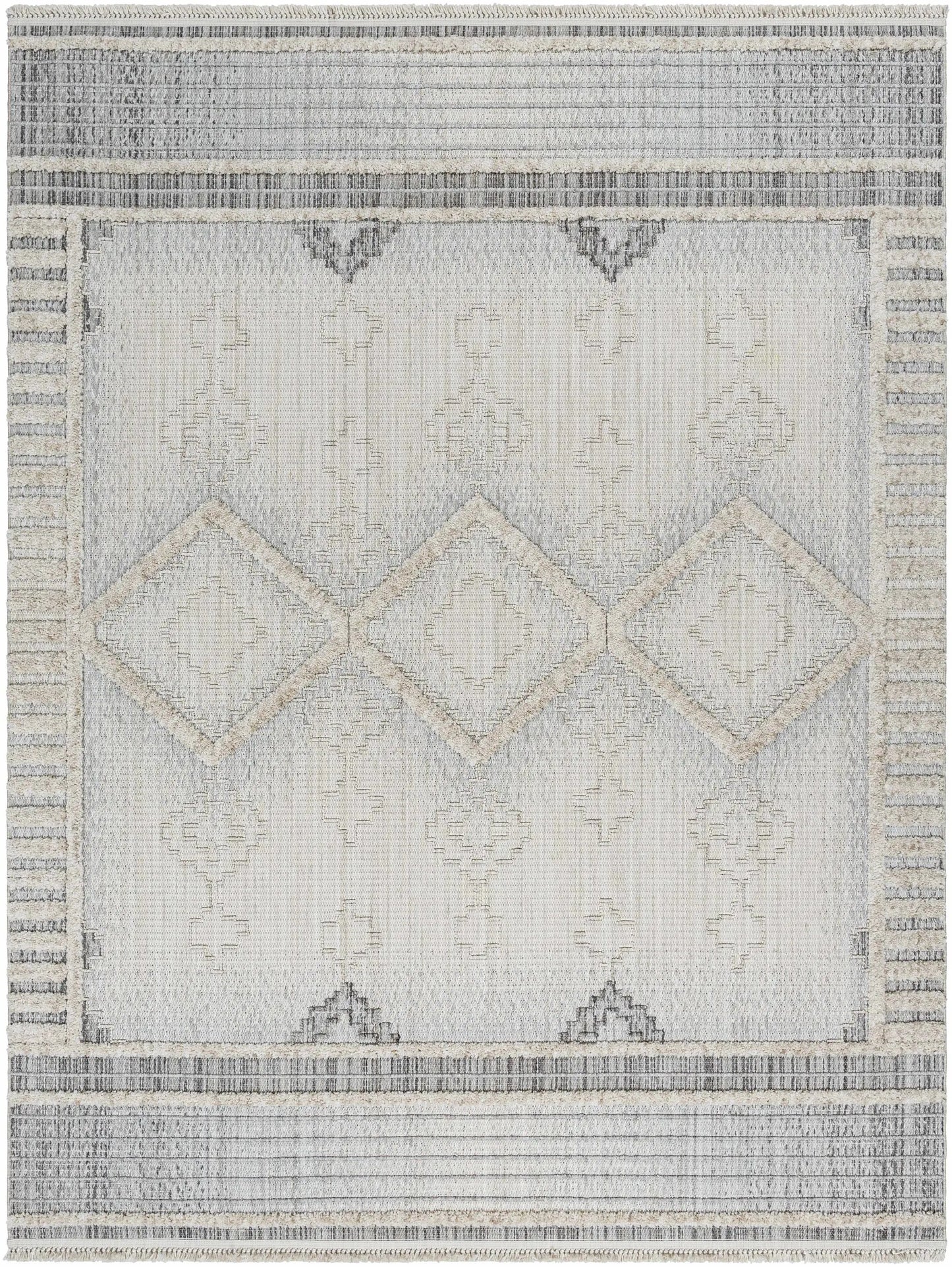 Amaga High-Low Rustic Bohemian Area Rug in gray and cream with diamond motifs and fringed border on Tampa Home & Garden Store