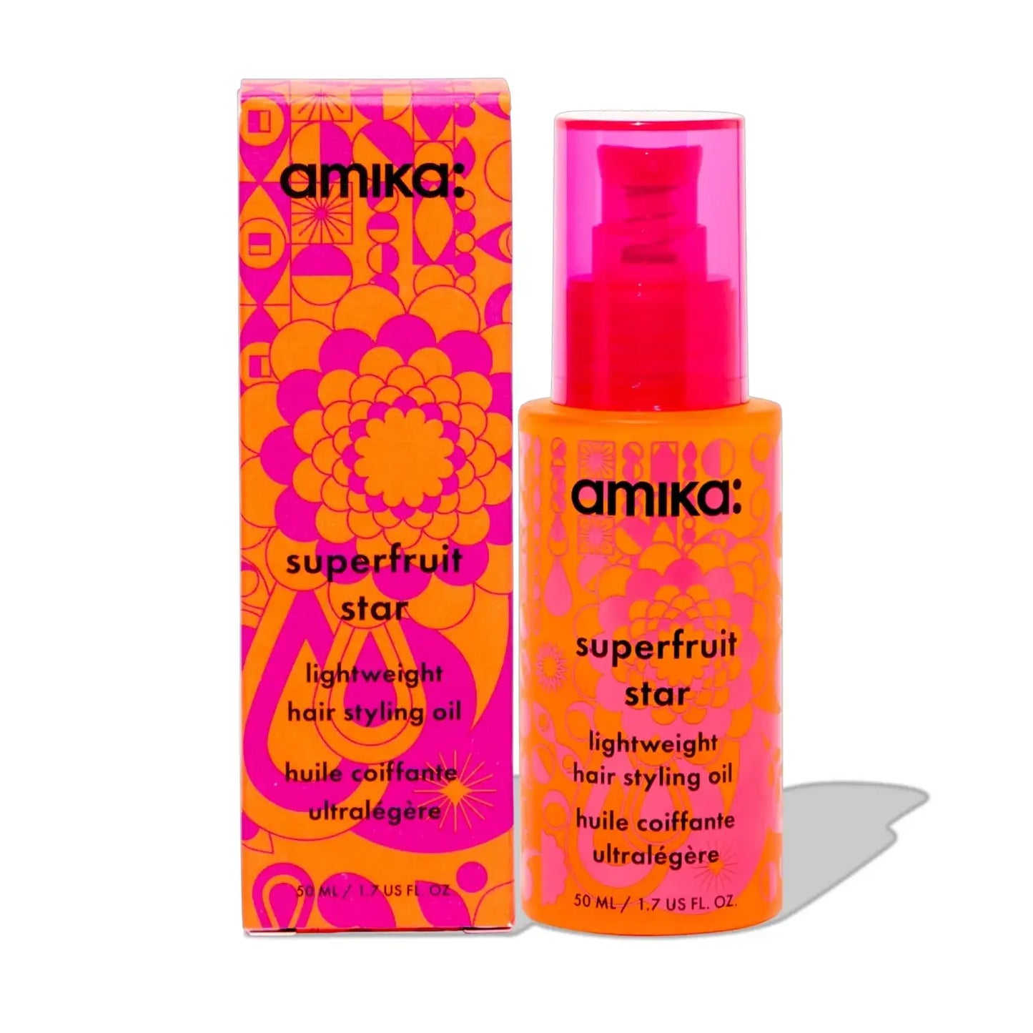 Amika Superfruit Star lightweight hair styling oil bottle with bright orange-pink packaging logo on Tampa Home & Garden Store