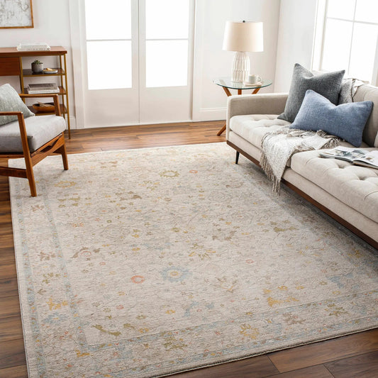 Amina Oushak Thick Luxe Area Rug, ivory with pale blue border and subtle pastel accents on Tampa Home & Garden Store