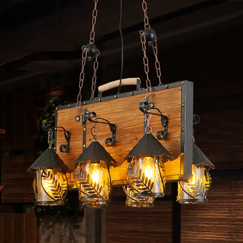 White glass chandelier with five lantern-style glass shades, backplate by Decorbites on Tampa Home & Garden Store