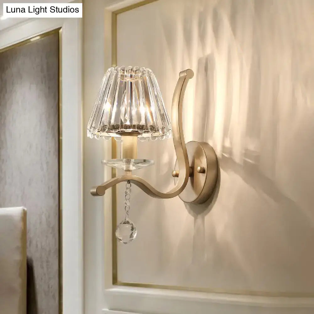 Gold Prism Antiqued Wall Sconce with crystal shade and curved brass arm by Decorbites on Tampa Home & Garden Store