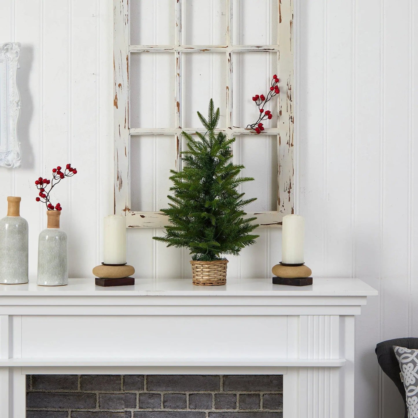 2 ft Christmas tree in a woven basket with clear LED lights, green foliage and red berry accents on Tampa Home & Garden Store
