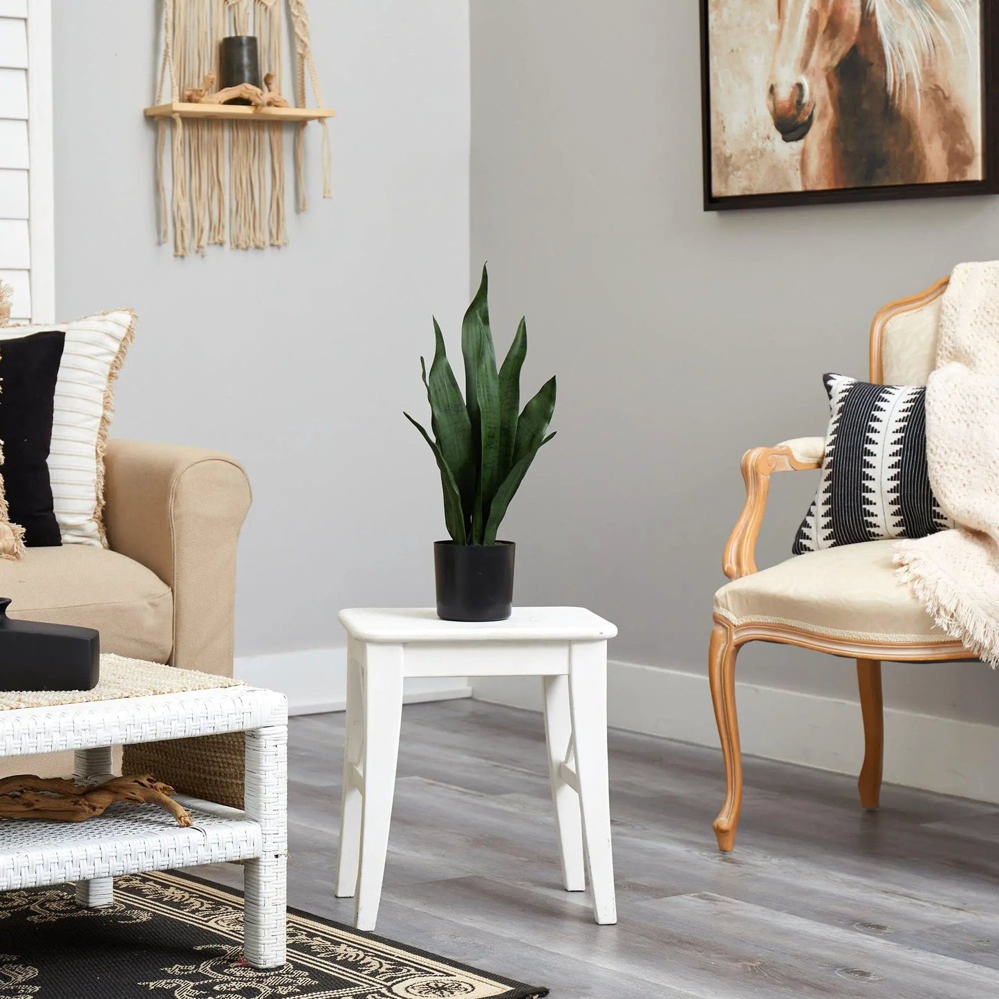 Sansevieria artificial plant 22 inches tall in black pot on white side table on Tampa Home & Garden Store